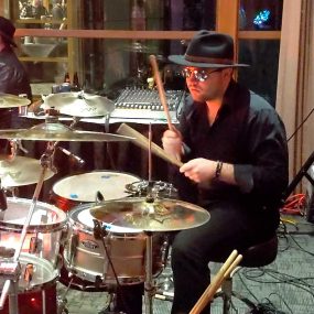 Brett on drums