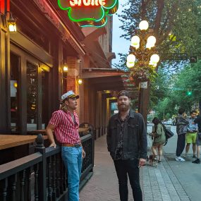 Lenny and Pete under the The Blarney Stone sign