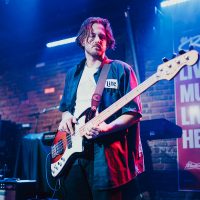 Dan Dan playing bass